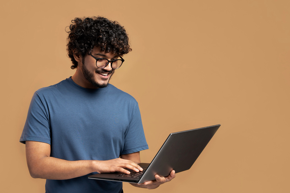 Indian Boy With Laptop