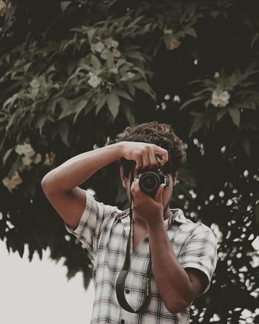 Indian Photographer With DSLR Camera